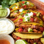 Kruidige pulled chicken taco’s