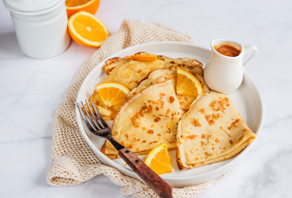 Crêpes suzette met sinaasappel-karamelsaus