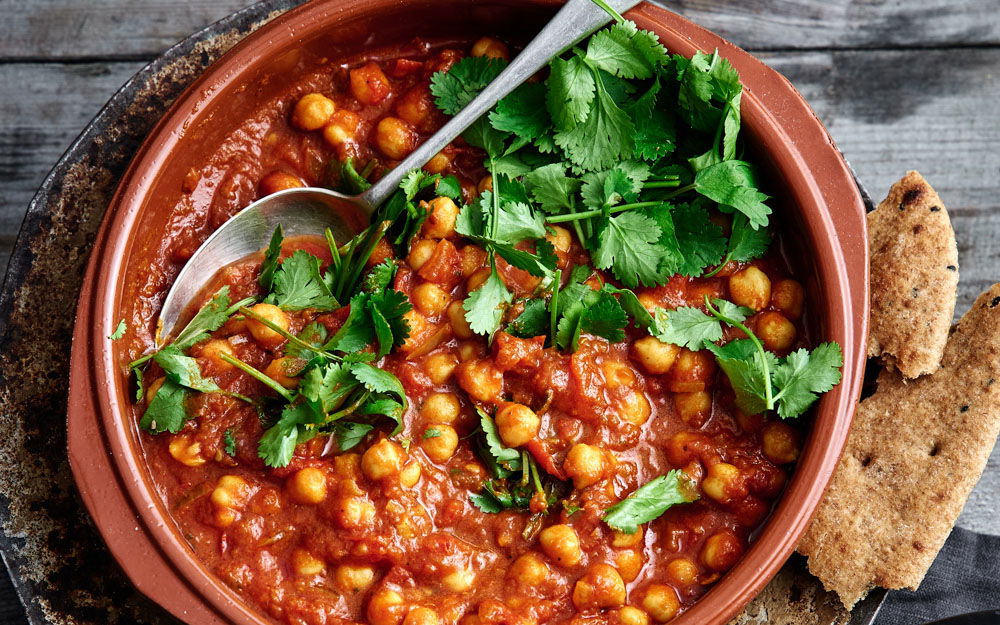 Vegetarische tikka masala curry met kikkererwten en tomaat