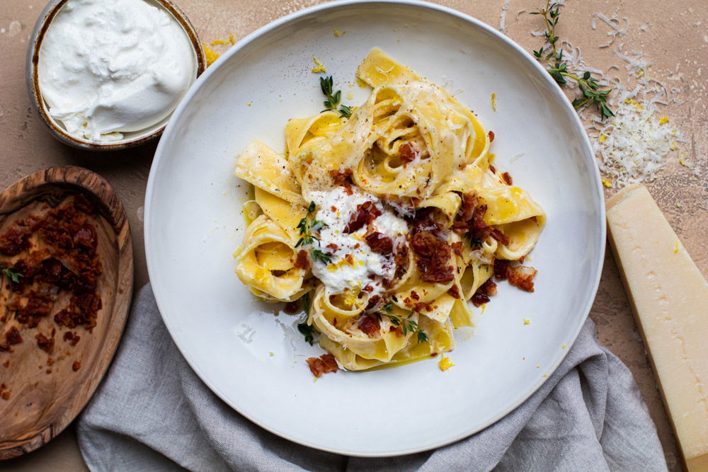 Pappardelle in limoncello roomsaus met krokante pancetta