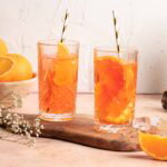Sinaasappel-perzik spritz