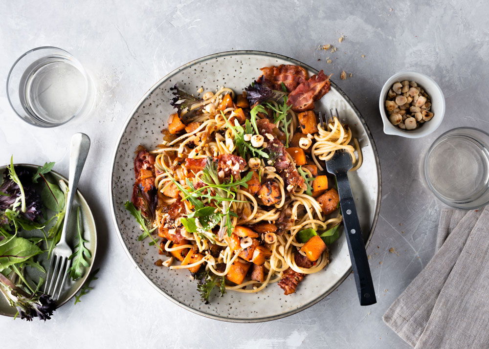 Spaghetti met pompoenblokjes en spek