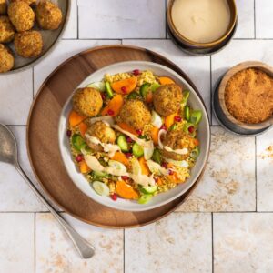 Couscous met falafel en tahindressing