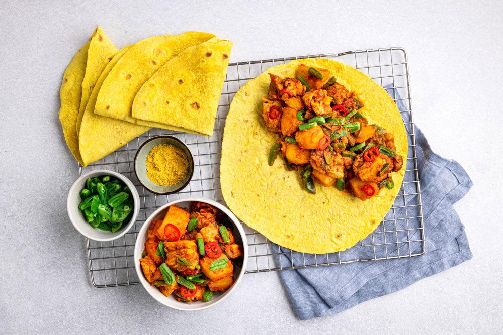 Roti met snijbonen, kippendij en aardappel