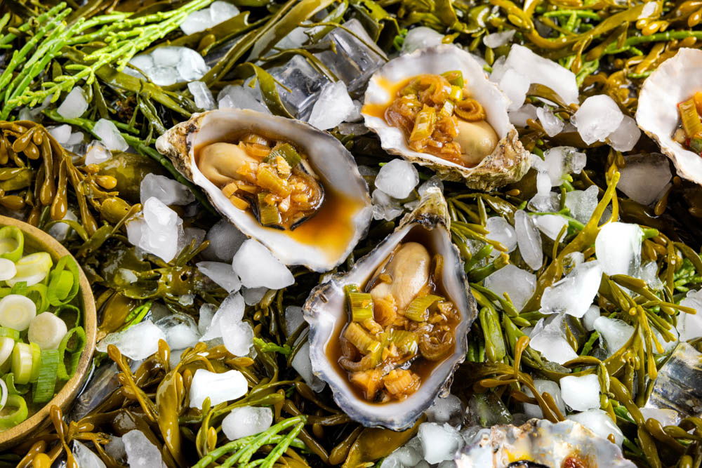 Gestoomde Oesterij oester met Tomasu, sjalot en gember