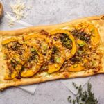 Flammkuchen met pompoen en Manchego