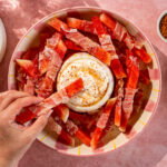 Watermeloen prosciutto bites met whipped ricotta